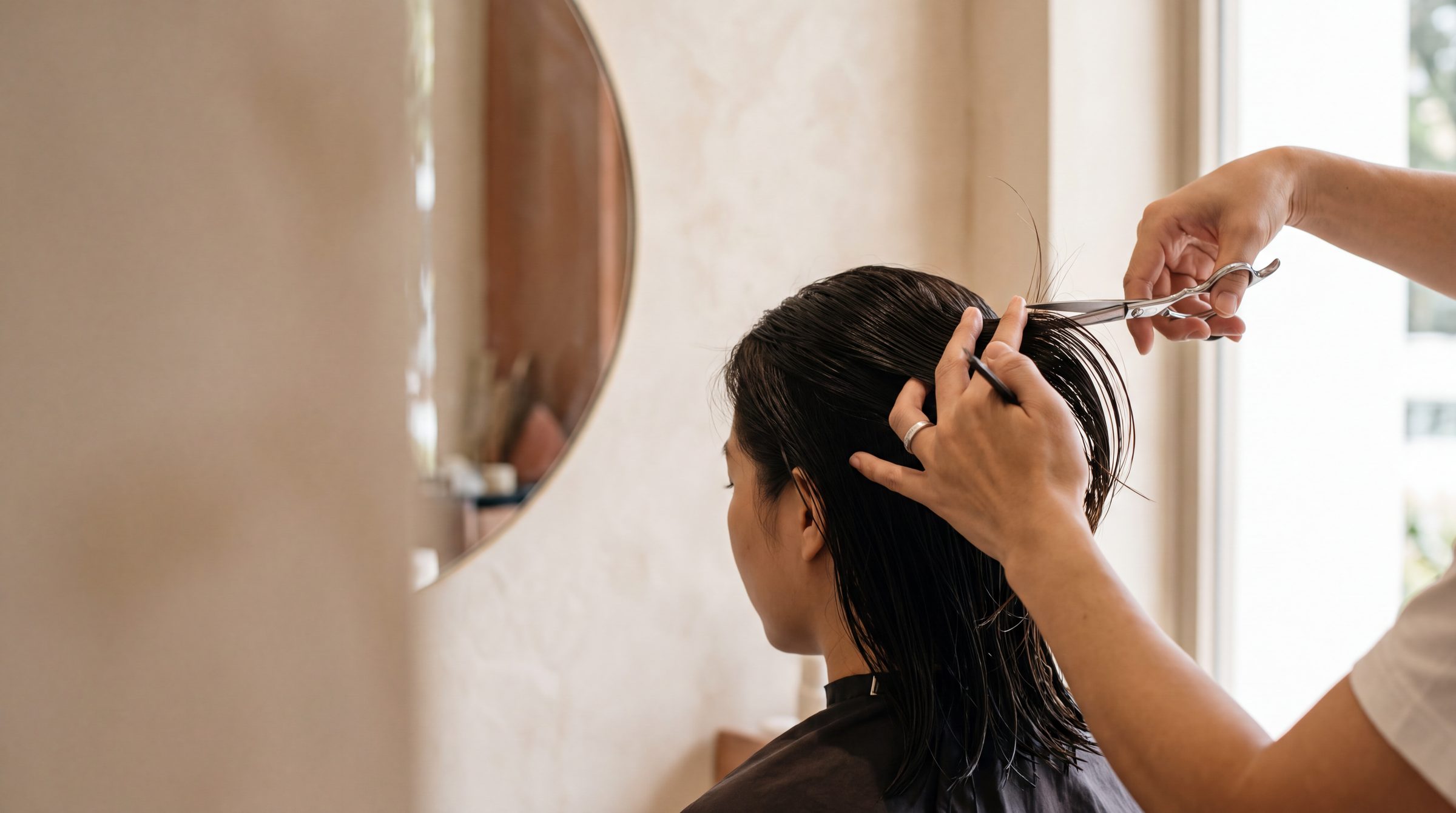 A precision haircut in progress at The Gallery Hair Studios